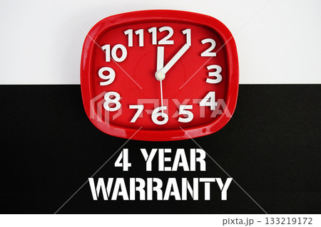 4 Year Warranty text and alarm clock on black and white background 4 Year Warranty text and alarm clock on black and white background 133219172