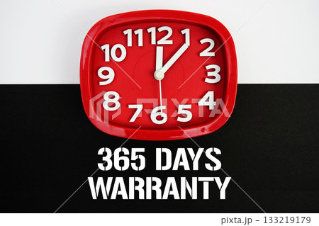 365 Days Warranty text and alarm clock on black and white background 365 Days Warranty text and alarm clock on black and white background 133219179
