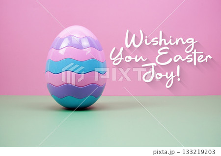 Easter Egg with text "Wishing You Easter Joy!" on pink and green background 133219203