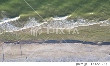 sandy beach on the seashore, view from above 133221253