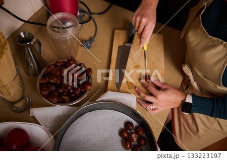 Home Kitchen Chestnut Prep With Knife On Cutting Board, Hands-On Cooking Activity 133223197