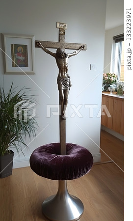 Crucifix is on a stand with a purple cushion Crucifix is on a stand with a purple cushion 133223971