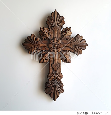 Wooden cross with a flower design on it 133223992