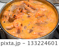 Shrimp in a metal pot with boiling water. 133224601