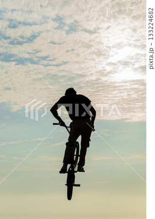 Freestyle cyclist practicing street BMX Freestyle cyclist practicing street BMX 133224682