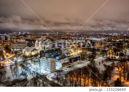 Aerial night View of Tallinn in winter, roofs are covered with snow, Christmas mood 133226689