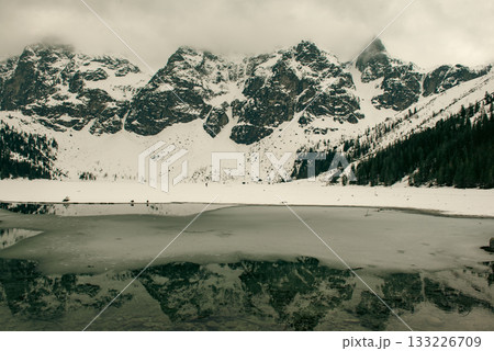 Frozen Lake Morskie Oko or Sea Eye Lake in Poland at Winter. 133226709