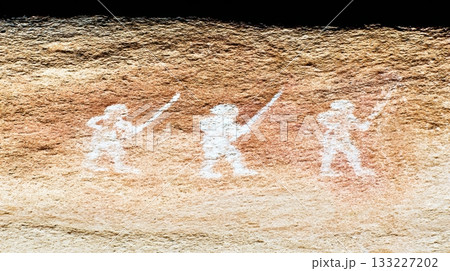 Primitive Human Figures Depicted With Spears in Ancient Rock Art From a Prehistoric Location Primitive Human Figures Depicted With Spears in Ancient Rock Art From a Prehistoric Location 133227202