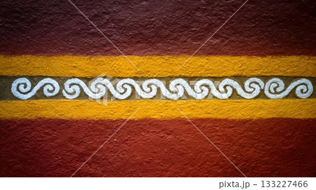 Colorful Primitive Spirals and Geometric Patterns Painted on a Textured Wall in Vibrant Hues Colorful Primitive Spirals and Geometric Patterns Painted on a Textured Wall in Vibrant Hues 133227466