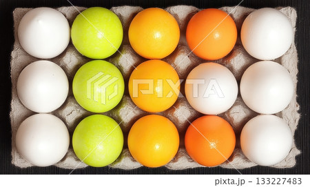 Brightly Colored Eggs in a Carton Demonstrating an Egg Recall Event Brightly Colored Eggs in a Carton Demonstrating an Egg Recall Event 133227483