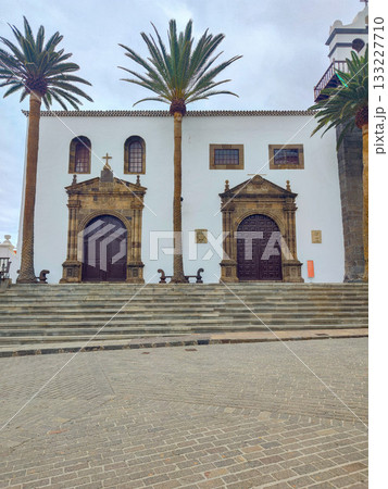 Experience the beauty of Historic Architecture alongside Palm Trees in a Scenic Plaza area Experience the beauty of Historic Architecture alongside Palm Trees in a Scenic Plaza area 133227710