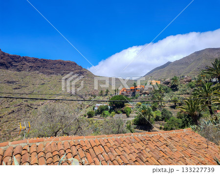 A Stunning and Breathtaking Scenic Mountain Landscape Under a Beautiful and Clear Blue Sky 133227739