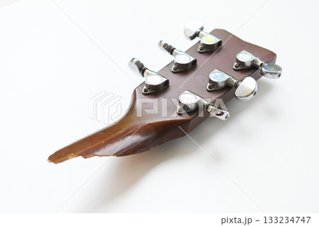 part of broken wood acoustic guitar isolated on white background part of broken wood acoustic guitar isolated on white background 133234747