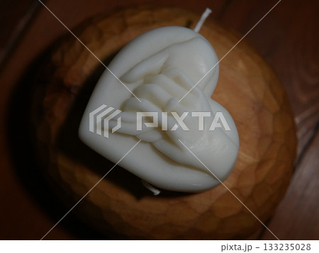 Heart Candle and Hands — Symbol of Love, Warmth and Connection 133235028