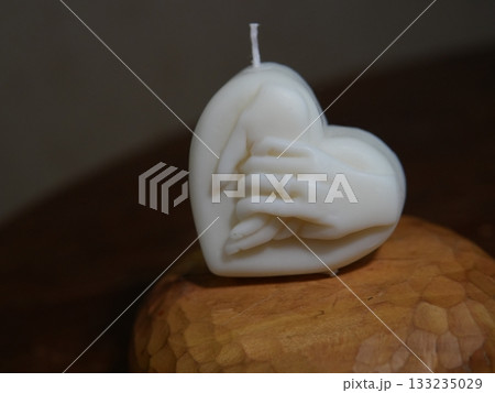 Heart Candle and Hands — Symbol of Love, Warmth and Connection 133235029