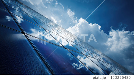 Polished solar panel clean energy technology reflecting blue sky and clouds, modern sustainable 133236489