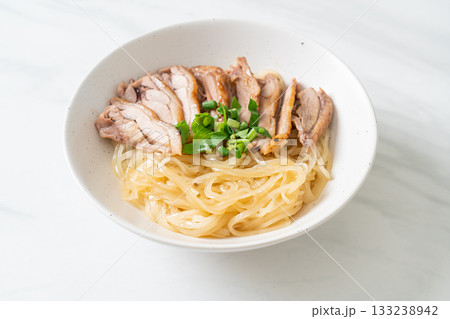 dried noodles with stewed duck in white bowl dried noodles with stewed duck in white bowl 133238942