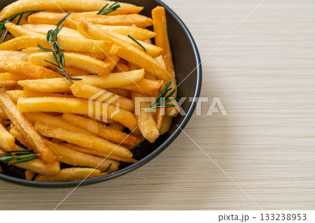 French fries with sour cream and ketchup 133238953