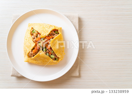 egg wrap or stuffed egg with minced pork and vegetable egg wrap or stuffed egg with minced pork and vegetable 133238959