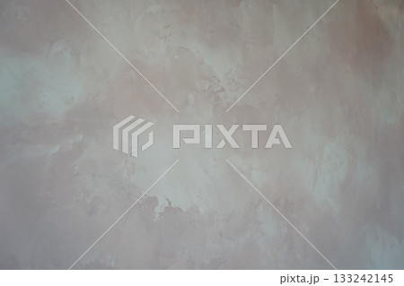 Subtle mauve plaster texture with blended hues and an abstract, elegant finish, suitable for a background or design element. Subtle mauve plaster texture with blended hues and an abstract, elegant finish, suitable for a background or design element. 133242145