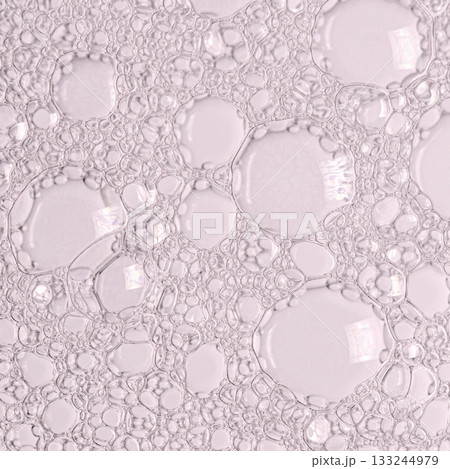 The texture of the foam of shower gel or soap suds. Macrophotography 133244979