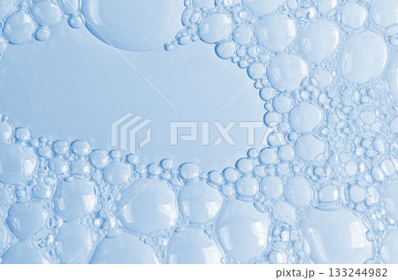 Bubbles of body gel or soap foam or shaving gel. Closeup. 133244982