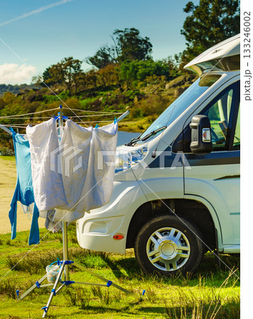 Camping. Clothes hanging to dry by camper rv. 133246002