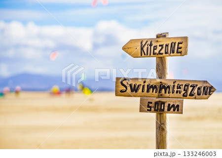 Kitezone and swimmingzone sign at beach. Kitezone and swimmingzone sign at beach. 133246003