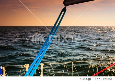 Yachting on sail boat during sunny weather 133246068