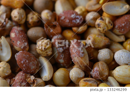Colorful assortment of roasted nuts and seeds gathered together in a delightful mix for a crunchy snack 133246299