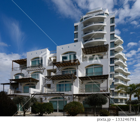 Modern architectural marvel in a sunny coastal location showcasing a stunning skyline Modern architectural marvel in a sunny coastal location showcasing a stunning skyline 133246791