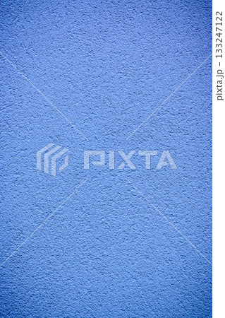 Vibrant blue wall texture inviting creativity under bright daylight Vibrant blue wall texture inviting creativity under bright daylight 133247122