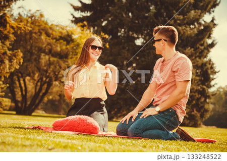 Young couple on picnic. Young couple on picnic. 133248522