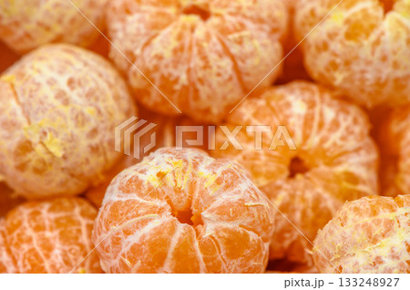 Juicy citrus delight showcases vibrant orange mandarins in a sunlit market setting Juicy citrus delight showcases vibrant orange mandarins in a sunlit market setting 133248927
