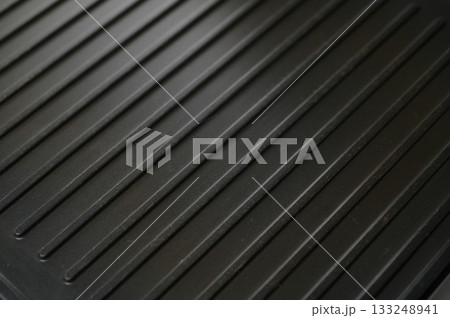 Grill surface ready for cooking perfect meals under the warm sun Grill surface ready for cooking perfect meals under the warm sun 133248941