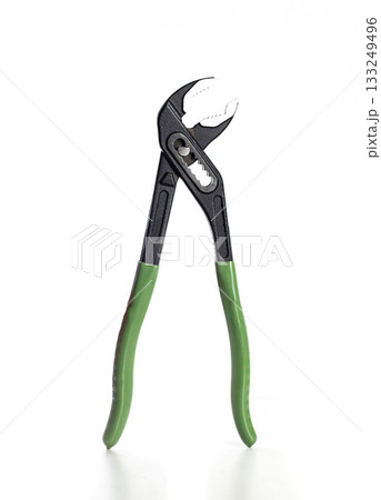 Pliers with green grips on white background for tool demonstration or DIY projects, isolate. White background Pliers with green grips on white background for tool demonstration or DIY projects, isolate. White background 133249496