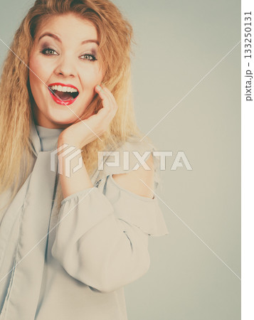 Happy positive smiling blonde woman 133250131