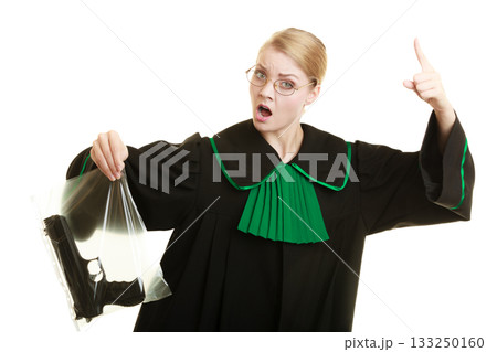 Woman lawyer with gun bag marked evidence for crime. Woman lawyer with gun bag marked evidence for crime. 133250160