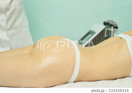Caucasian female undergoing cosmetic procedure in medical setting Caucasian female undergoing cosmetic procedure in medical setting 133250314