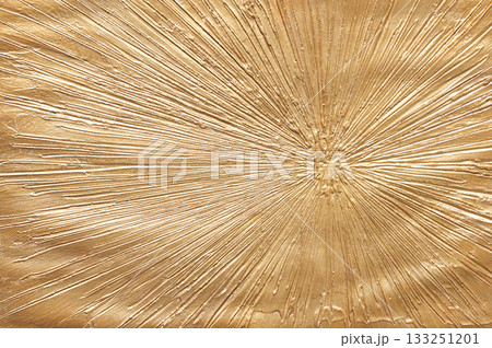 Golden textured abstract art with radiating lines and sunburst pattern 133251201