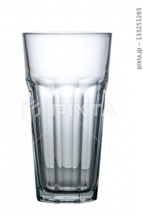 Clear glass tumbler filled with refreshing water on a bright summer day 133251265