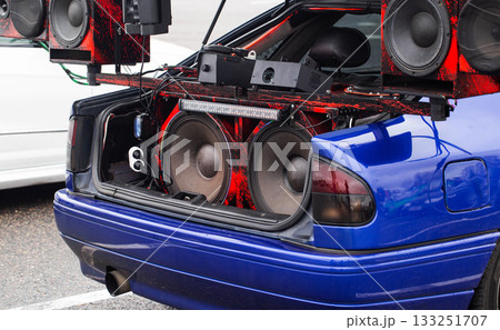 Open Trunk Of Blue Car Displays Huge Custom Audio System. Competition Vehicle Is Equipped With Large Subwoofers. 133251707