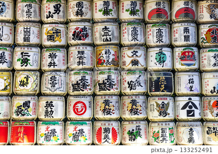 Traditional sake barrels decorating japanese shinto shrine wall Traditional sake barrels decorating japanese shinto shrine wall 133252491