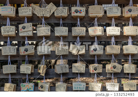 Ema wishing plaques hanging at japanese shrine 133252493
