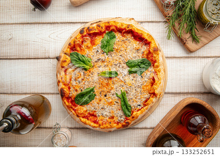 Italian pizza with spinach and cheese Italian pizza with spinach and cheese 133252651