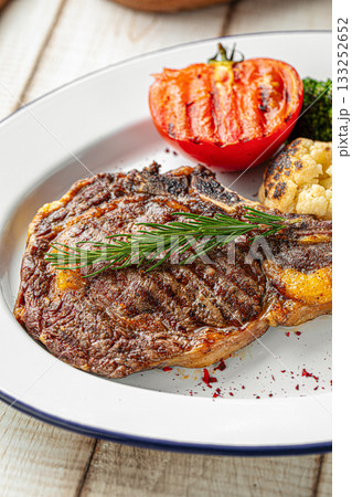 Grilled ribeye steak with vegetables 133252652