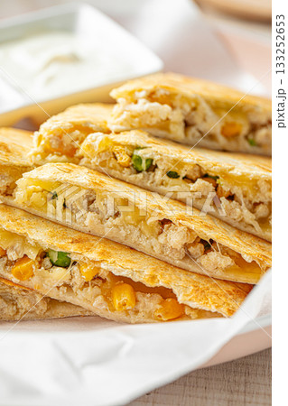 Quesadilla with chicken and cheese Quesadilla with chicken and cheese 133252653
