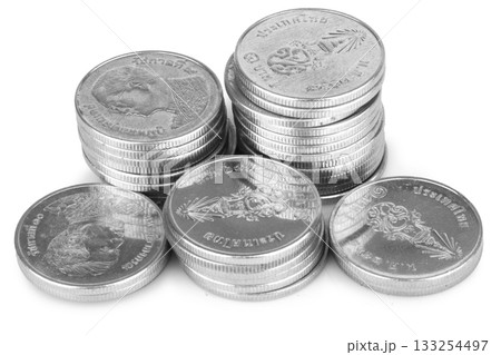 Silver coins on a white background Silver coins on a white background 133254497