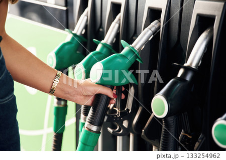 Young woman on the gas station Young woman on the gas station 133254962