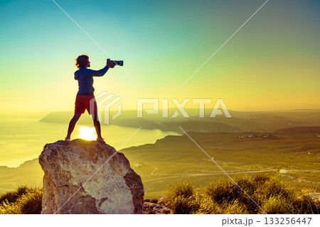 Woman with camera take travel photo Woman with camera take travel photo 133256447